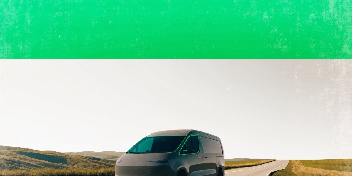 A modern electric panel van on a broad empty road curving through open countryside under a wide clear sky