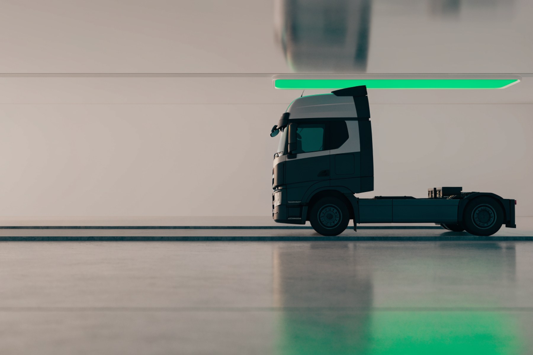 An HGV in an inspection lane under a green light